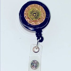 Retractable badge holder